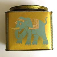 Old golden tea tin with beautiful asian graphics