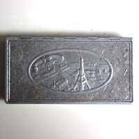 Old cigarette tin, embossed sight of Paris